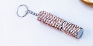 Essence Elysium: Keychain Perfume Bottle - Fragrance on the Go.