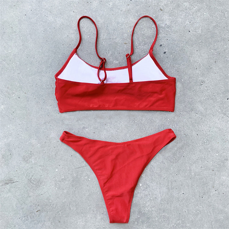 Female split solid color bikini