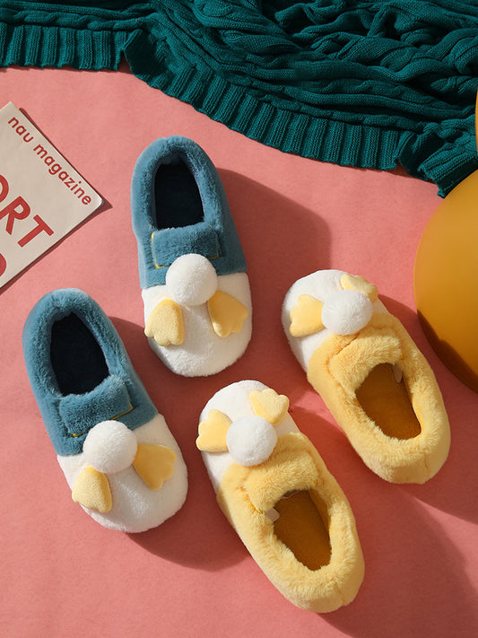 CoupleCozy: Plush home slippers for a warm and comfortable experience.