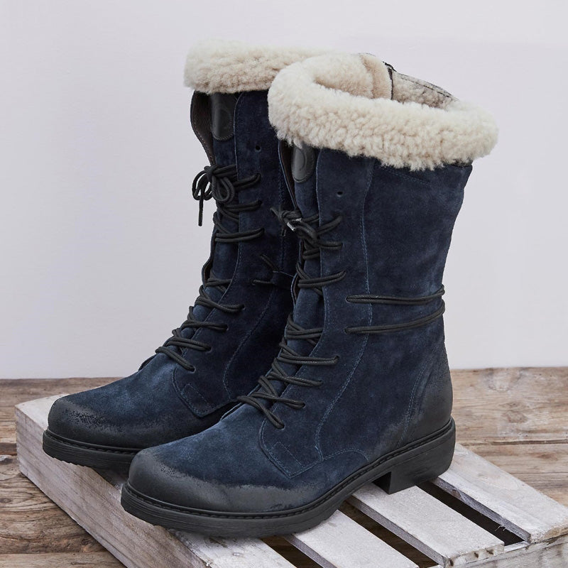 Introducing XCozy Thermal Mid-Tube Cotton Boots—cross-strap style for warmth and fashion in every winter step.