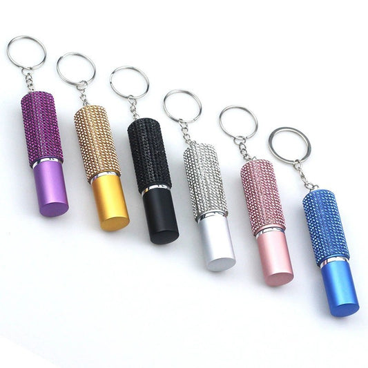 Essence Elysium: Keychain Perfume Bottle - Fragrance on the Go.