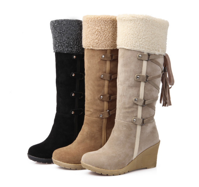 Elevate winter style with GlamStrides Knee High Wedge Boots: Warm, chic, and snow-ready in black and yellow hues.