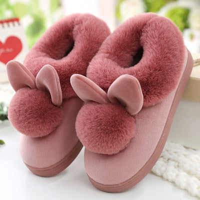 SnuggleSack: Women's winter slippers with a bag for cozy home comfort.