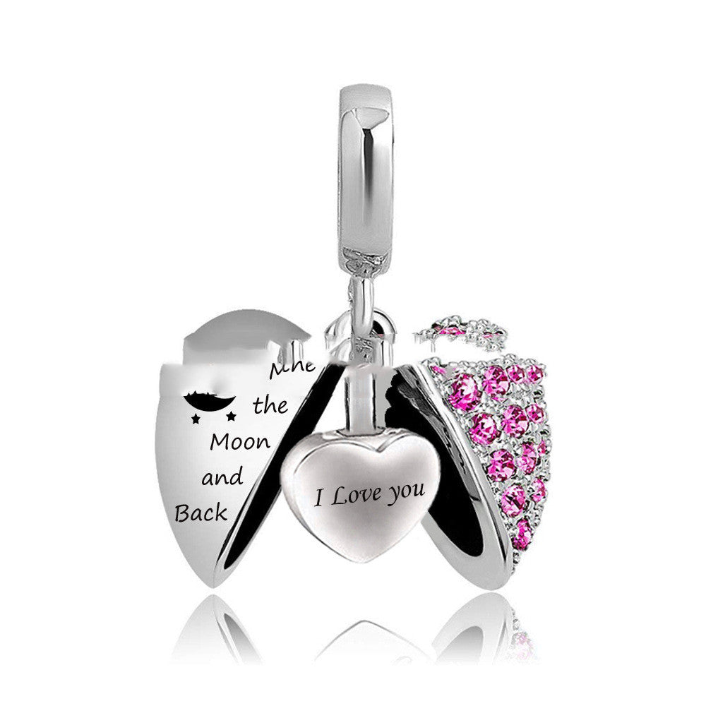 Essence Elysium: Wing Heart Stainless Steel Perfume Pendant.