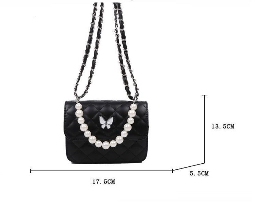 LuxeAura: Butterfly Bag, a stylish and minimalist accessory for women's fashion.