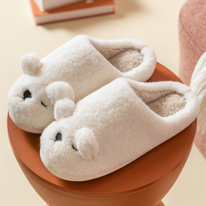 CuteCocoon: Winter home slippers with a cute bag for cozy warmth.