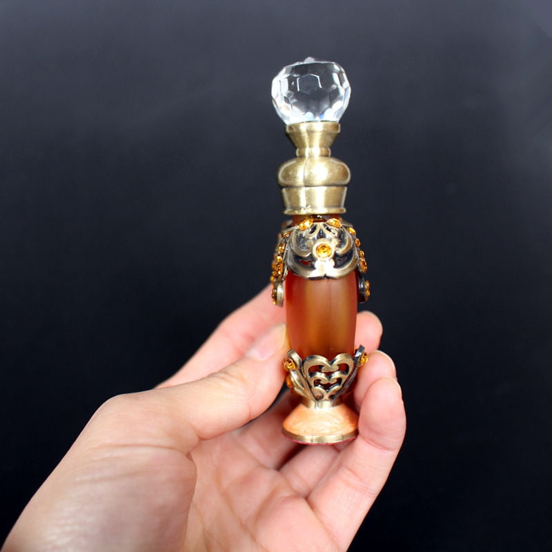 Essence Elysium: Vintage Glass Essential Oil Perfume Bottle.