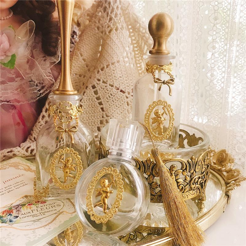 Essence Elysium: French Angel Vintage Perfume Bottle.