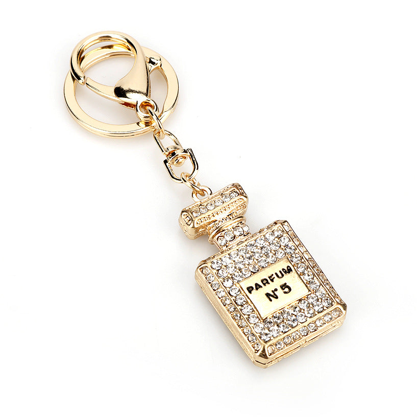 Essence Elysium: Creative Crystal Perfume Bottle Rhinestone Keychain.