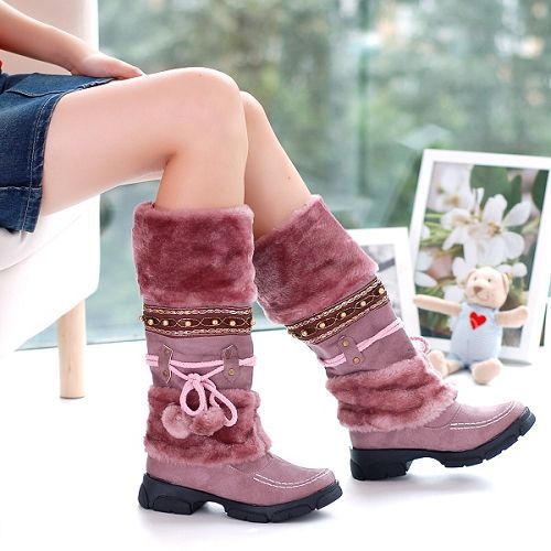 DocStride's SnowSizzle Winter Boots - Stay fashionable and cozy with these sexy high-heeled snow boots, designed to keep you stylish and warm during the winter months.