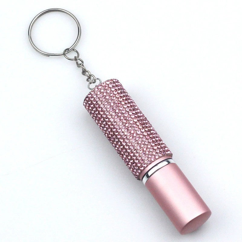 Essence Elysium: Keychain Perfume Bottle - Fragrance on the Go.