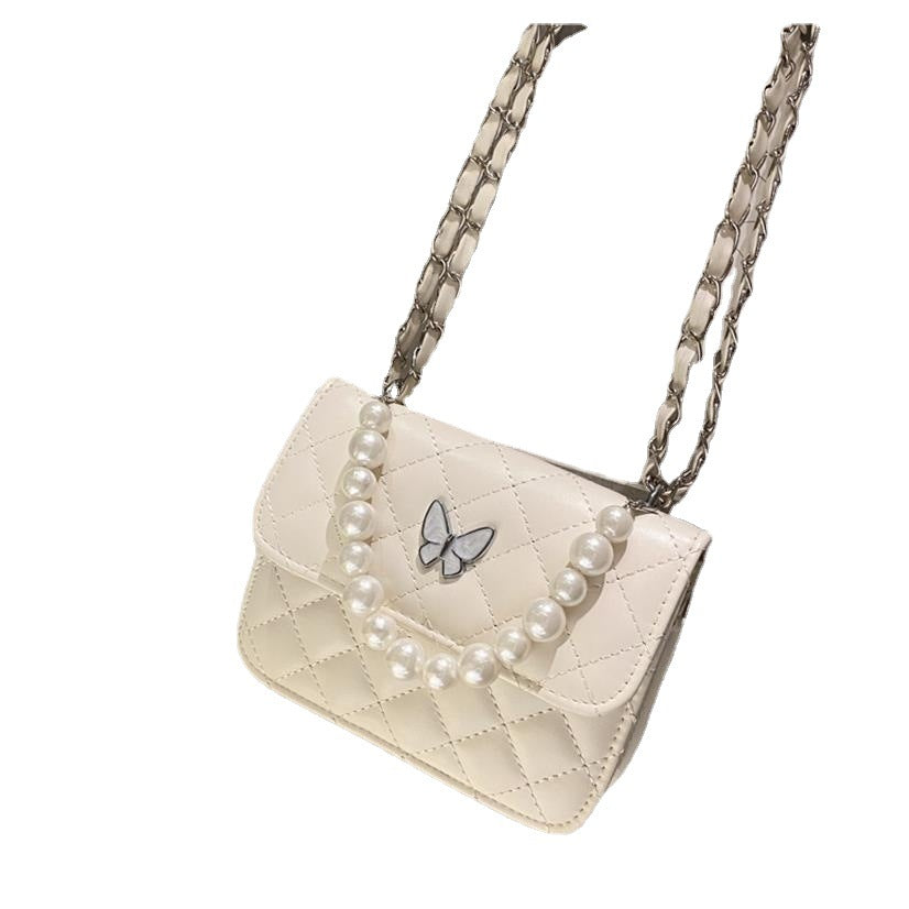 LuxeAura: Butterfly Bag, a stylish and minimalist accessory for women's fashion.