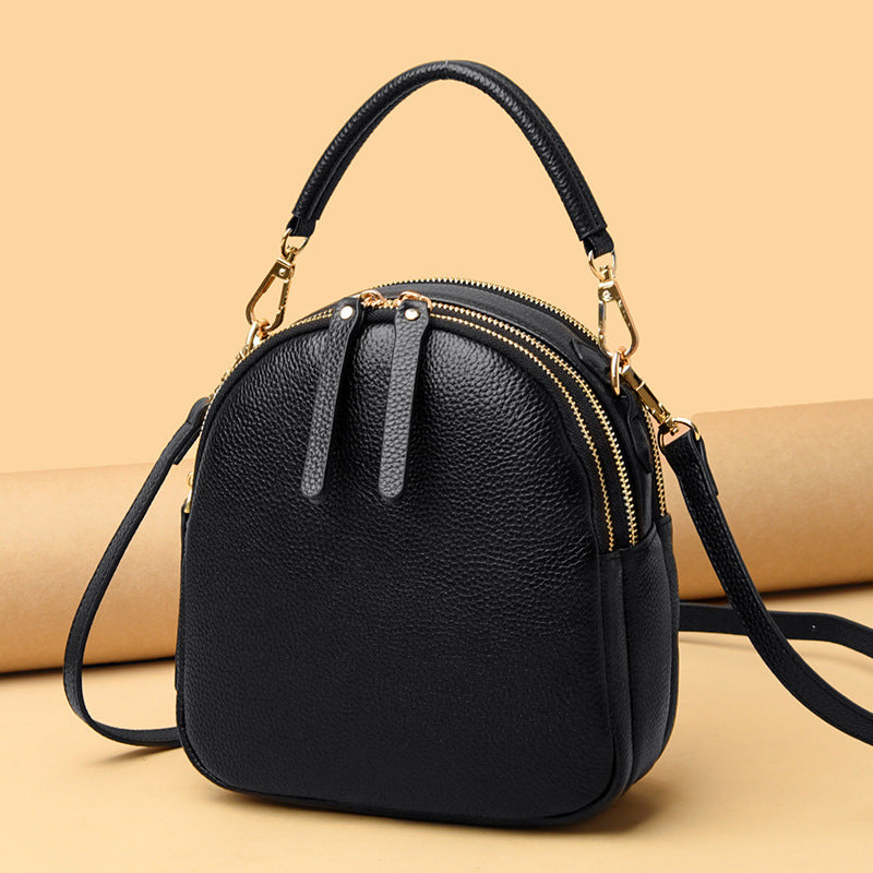 LuxeAura: The Top Layer Cowhide Leather Chain Bag, a symbol of timeless sophistication and style.