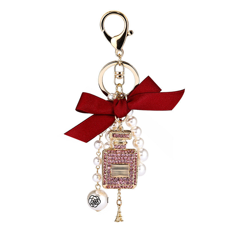 Essence Elysium: Creative Crystal Perfume Bottle Rhinestone Keychain.