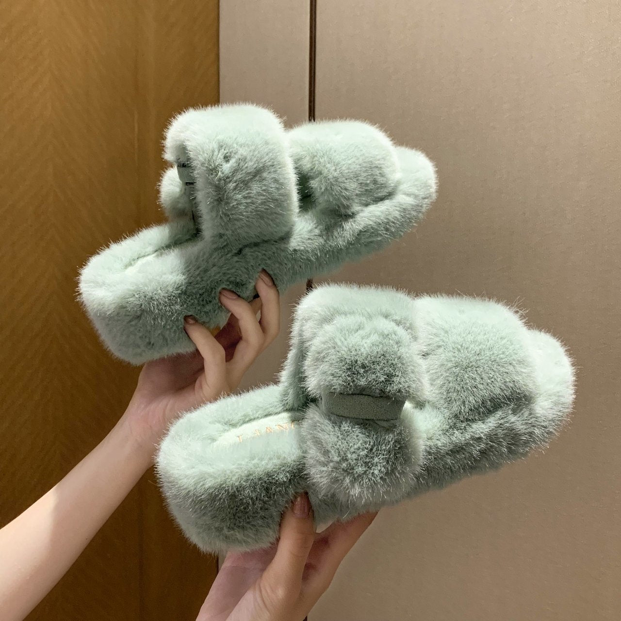 PlushLuxe: Women's plush slippers for a warm and cozy feel.