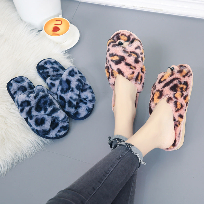 LeopardLuxe: Cross-strap fuzzy slippers with plush comfort, perfect for flat bedroom style and women's coziness.