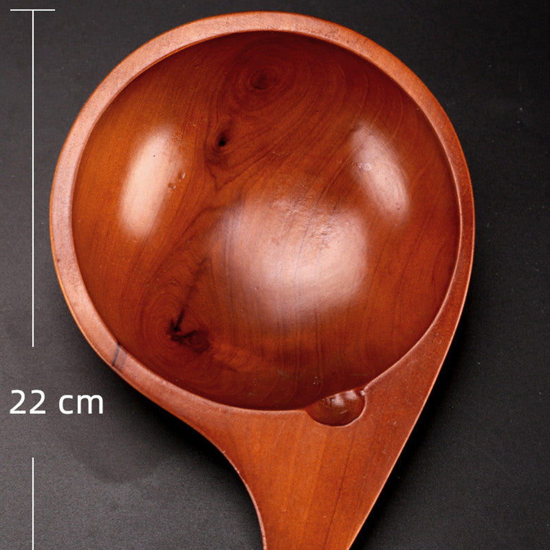 Wooden spoon water scoop