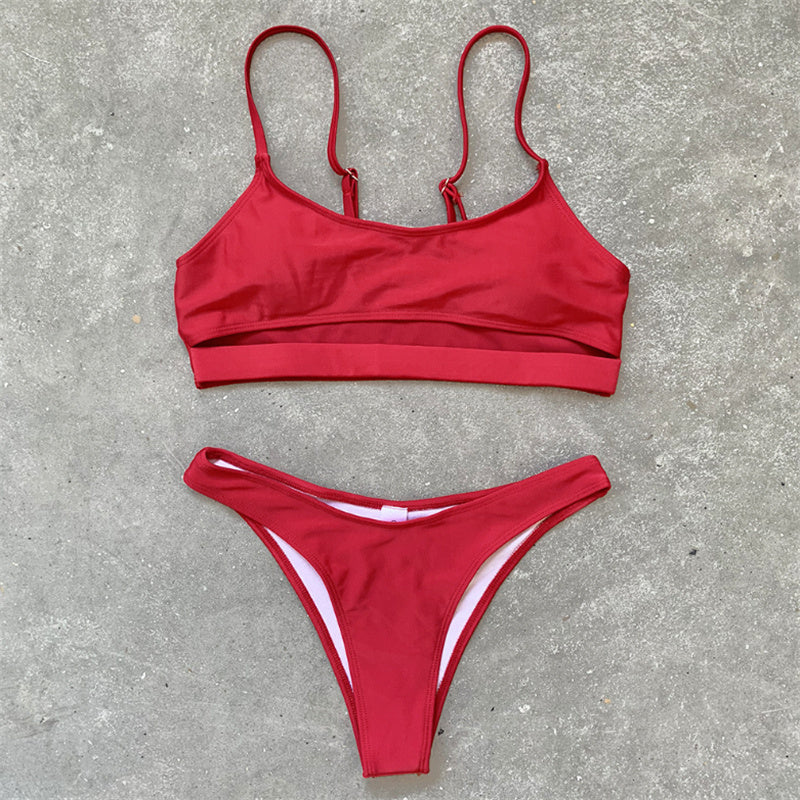 Female split solid color bikini