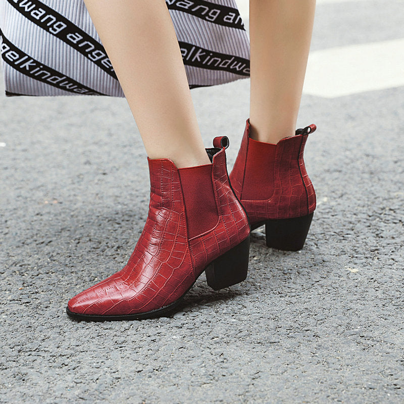 Pointy stone-lined ankle boots