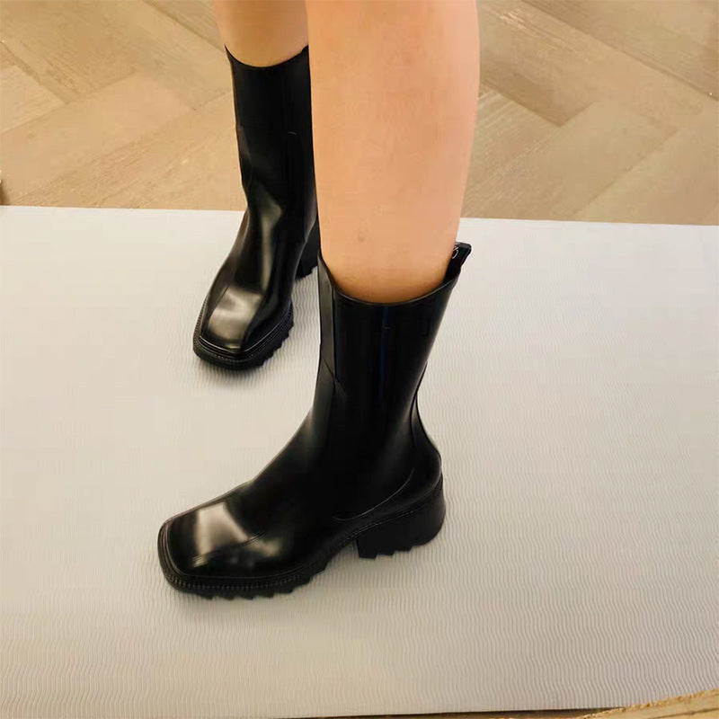 Wavy thick-soled middle boots