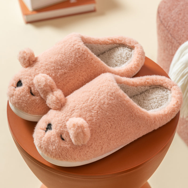 CuteCocoon: Winter home slippers with a cute bag for cozy warmth.