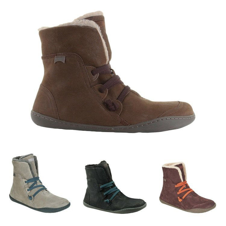 DocStride's StrapHug Boots - Elevate your style with these low tube boots featuring trendy strap accents for a chic look.