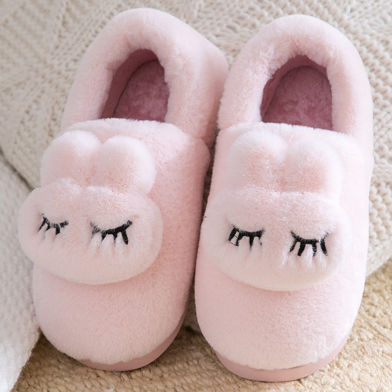 CuteCocoon: Winter home slippers with a cute bag for cozy warmth.