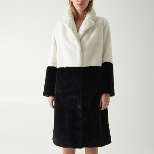 Fur Elegance: Women's warm fur coat for winter sophistication.