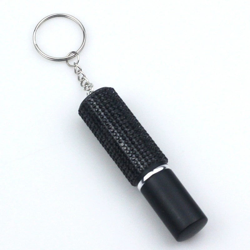 Essence Elysium: Keychain Perfume Bottle - Fragrance on the Go.