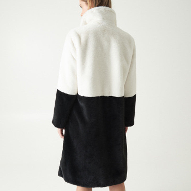 Fur Elegance: Women's warm fur coat for winter sophistication.