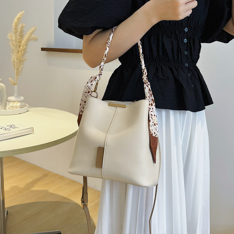 LuxeAura: The Summer Fashion Shoulder Bag, a casual and chic accessory designed for women's everyday style.