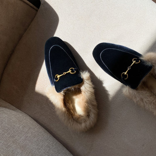 BunnySoft: Experience luxury with wear rabbit fur slippers for cozy warmth.