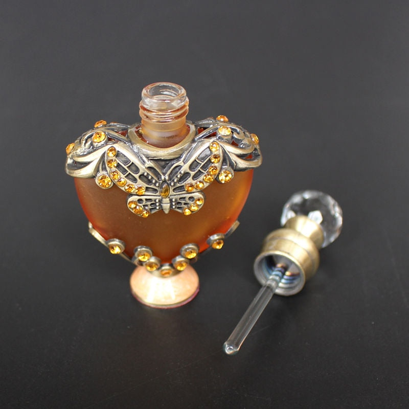 Essence Elysium: Vintage Glass Essential Oil Perfume Bottle.