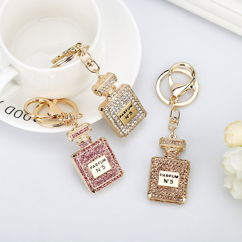 Essence Elysium: Creative Crystal Perfume Bottle Rhinestone Keychain.