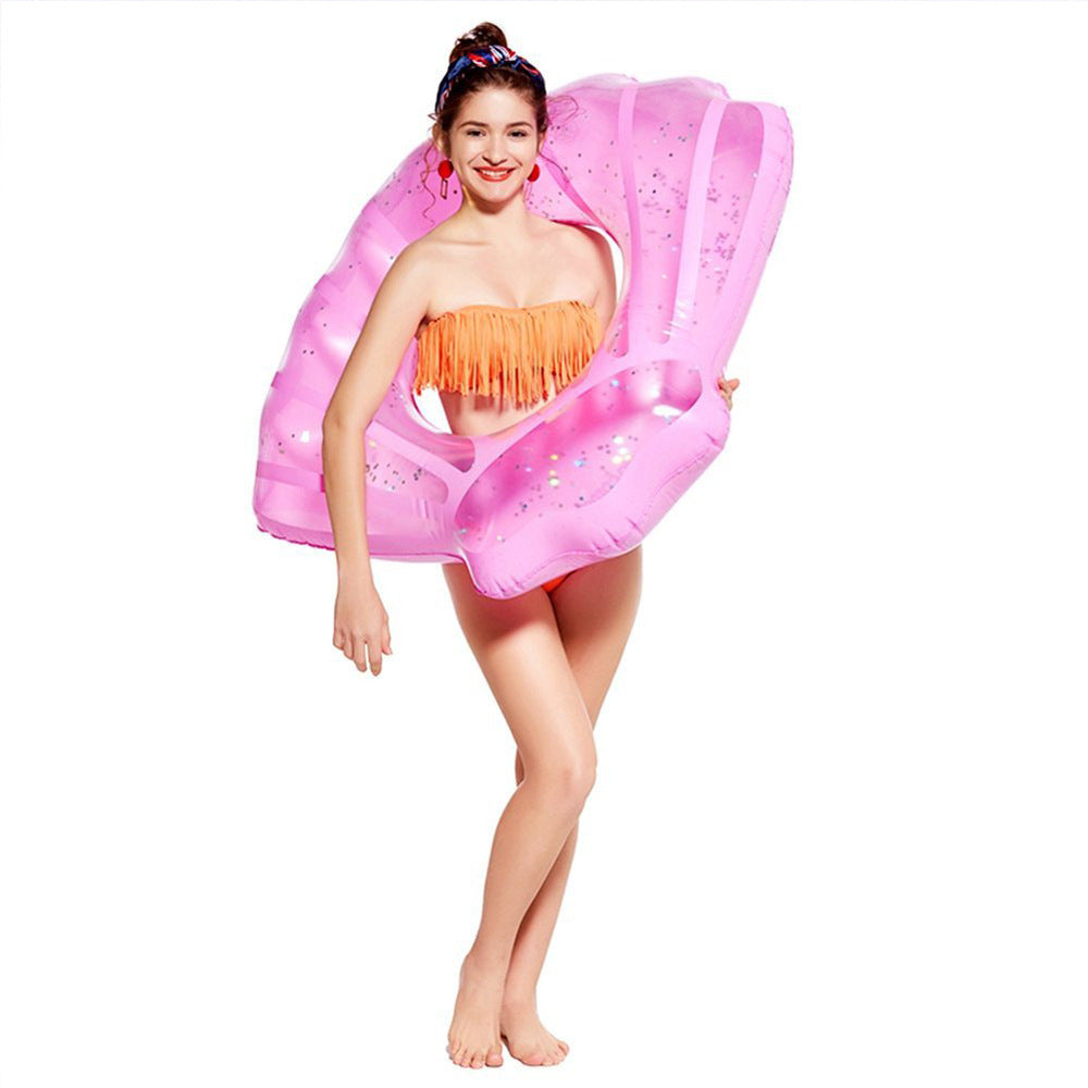 Inflatable sequined shell swimming ring floating row on water