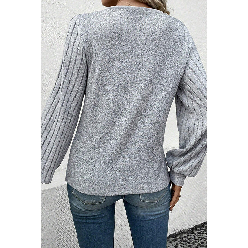 Vielseitiges Must-have: Langarmshirt für Damen in reiner Farbe und passendem Allroundtalent.