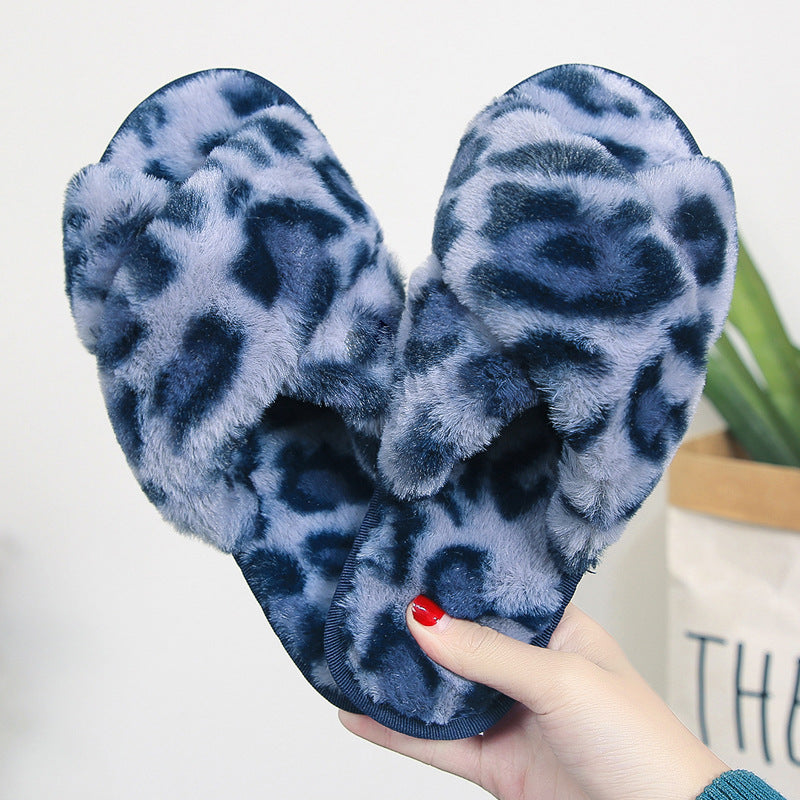 LeopardLuxe: Cross-strap fuzzy slippers with plush comfort, perfect for flat bedroom style and women's coziness.