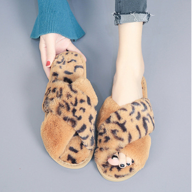 LeopardLuxe: Cross-strap fuzzy slippers with plush comfort, perfect for flat bedroom style and women's coziness.