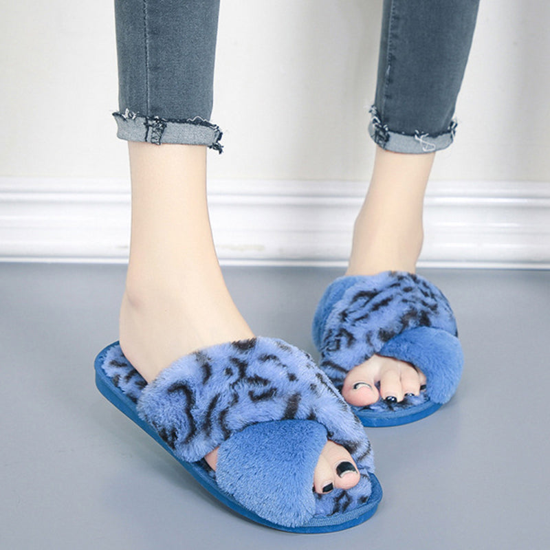 LeopardLuxe: Cross-strap fuzzy slippers with plush comfort, perfect for flat bedroom style and women's coziness.