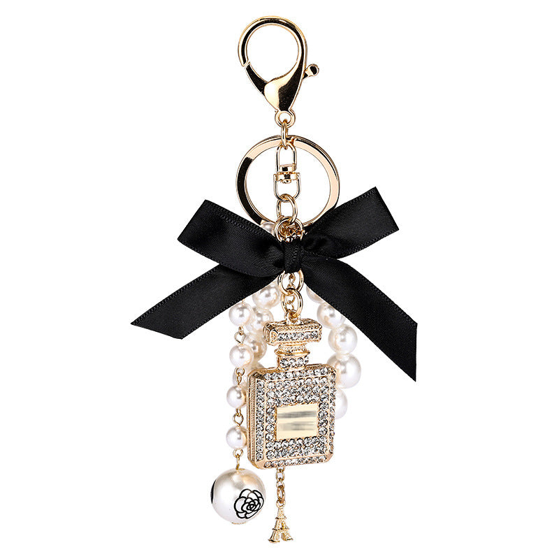 Essence Elysium: Creative Crystal Perfume Bottle Rhinestone Keychain.