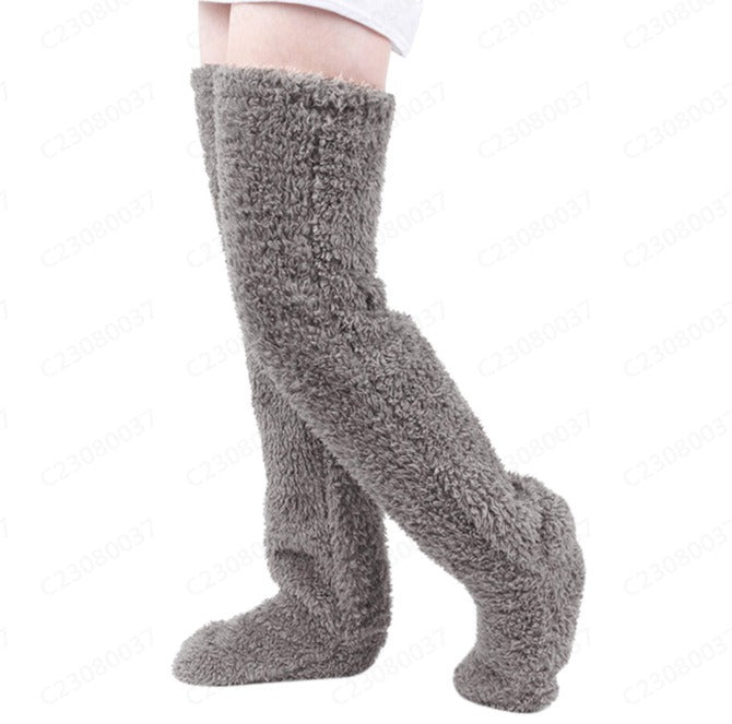 PlushCharm: Indoor plush warmth with long socks, fuzzy over-knee leg warmers, and cozy stocking slippers for winter comfort.