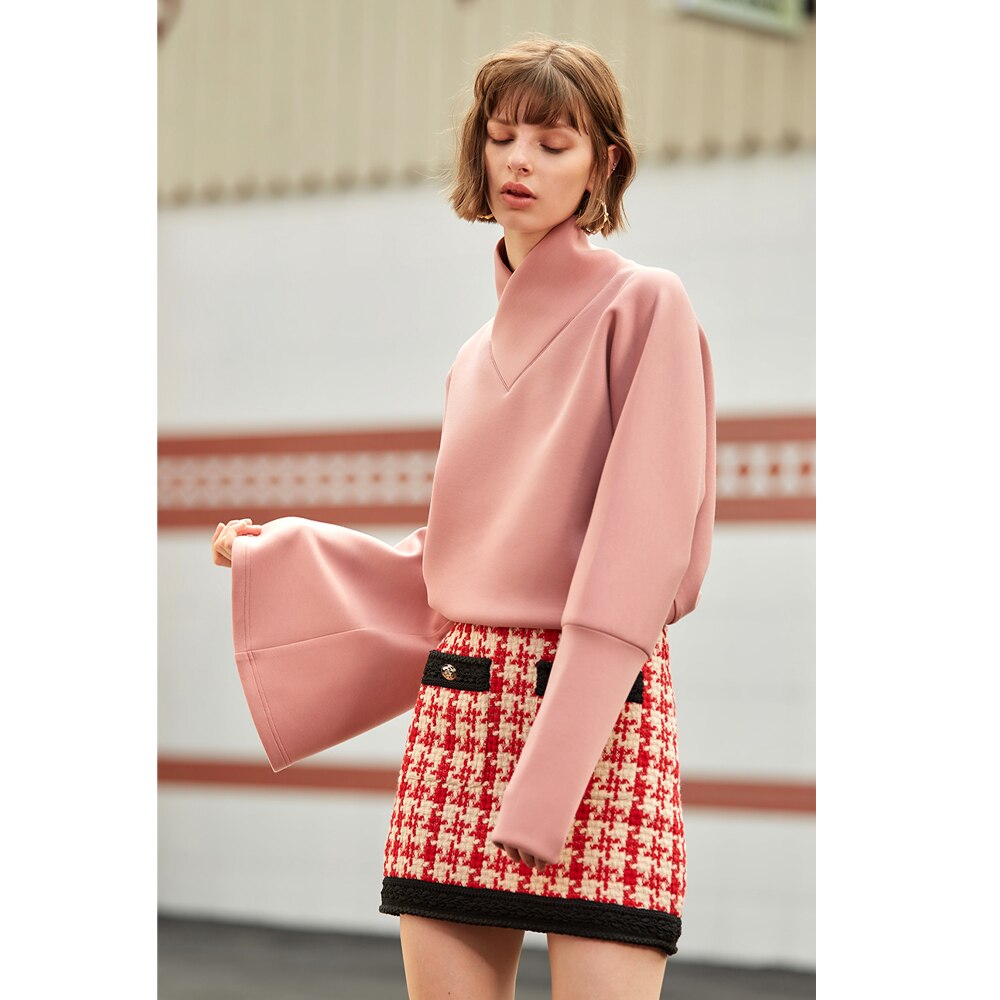 Pink Comfort: Women's full sleeve cute sweater perfect for spring.