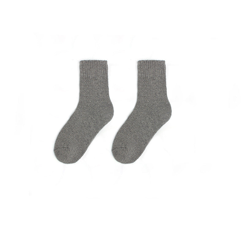 Verwöhnen Sie sich mit unserer weichen Umarmung unserer preisgünstigen dicken Wollsocken für Damen für Herbst/Winter. Erleben Sie sanfte Wärme und Komfort bei jedem Schritt. Kaufen Sie jetzt gemütliche Eleganz.