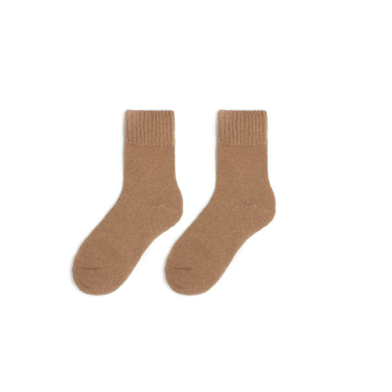 Indulge in the soft embrace of our budget-friendly Autumn/Winter Thick Wool Socks for women. Experience gentle warmth and comfort with every step. Shop now for cozy elegance.