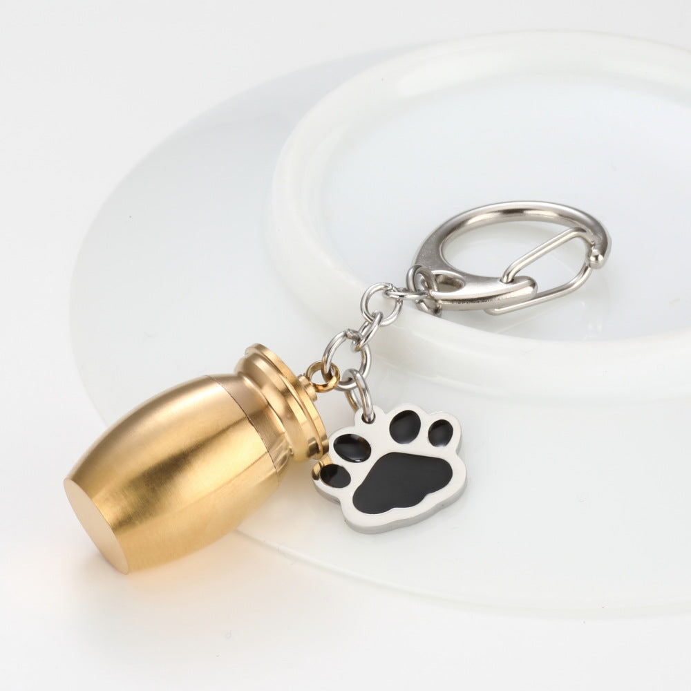 Essence Elysium Perfume Bottle Keychain: Drop Oil, Dog's Paw Design.