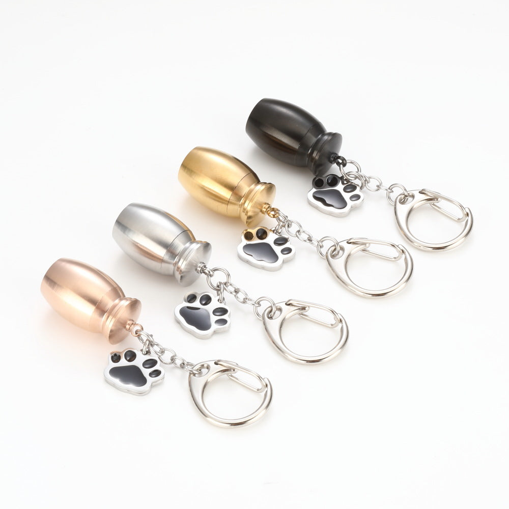 Essence Elysium Perfume Bottle Keychain: Drop Oil, Dog's Paw Design.