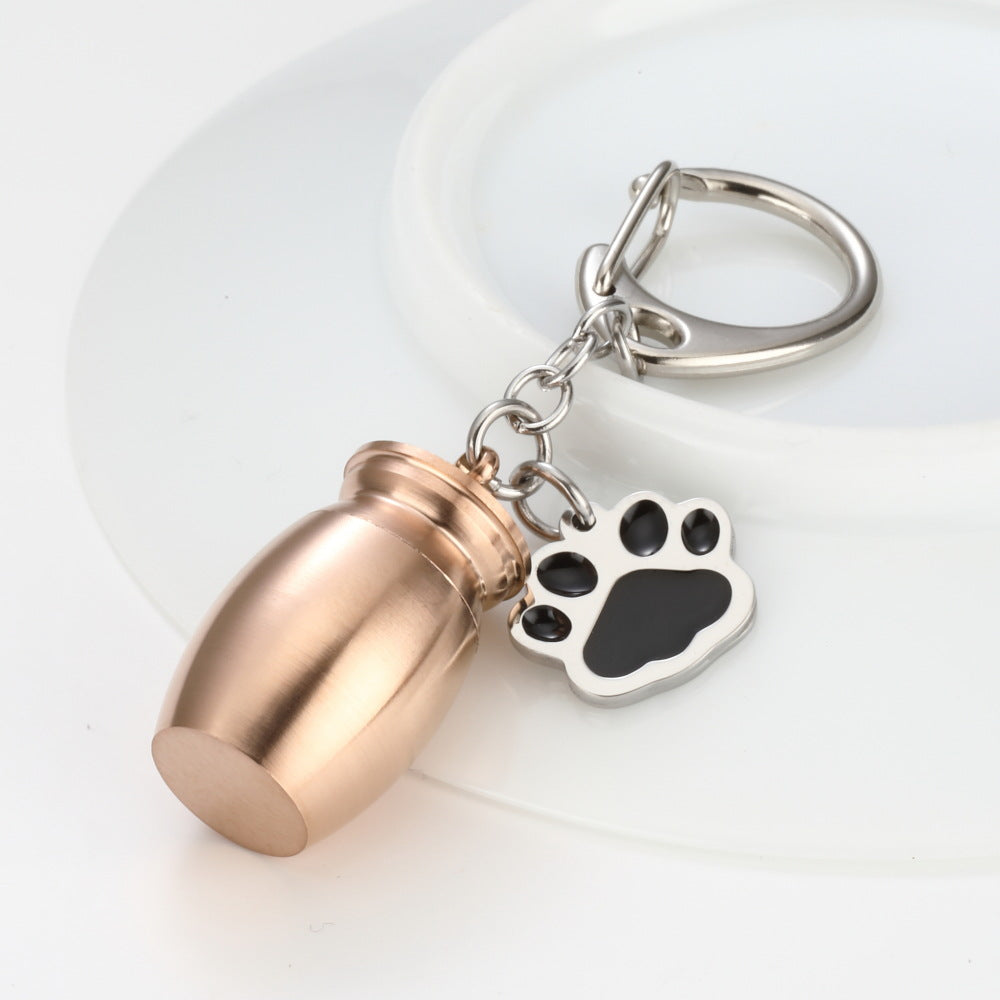 Essence Elysium Perfume Bottle Keychain: Drop Oil, Dog's Paw Design.