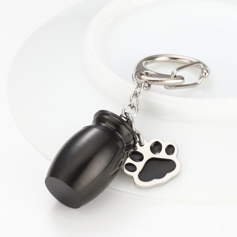 Essence Elysium Perfume Bottle Keychain: Drop Oil, Dog's Paw Design.