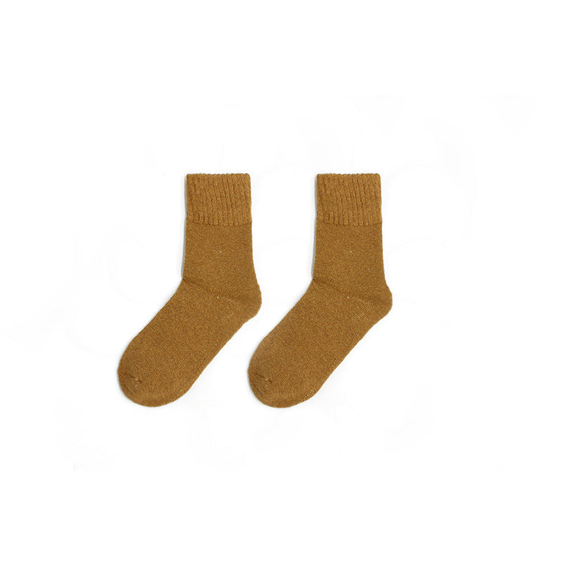 Indulge in the soft embrace of our budget-friendly Autumn/Winter Thick Wool Socks for women. Experience gentle warmth and comfort with every step. Shop now for cozy elegance.