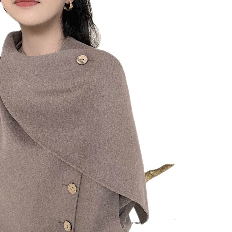 Scarfed Elegance: Women's woolen coat with a distinctive design scarf.